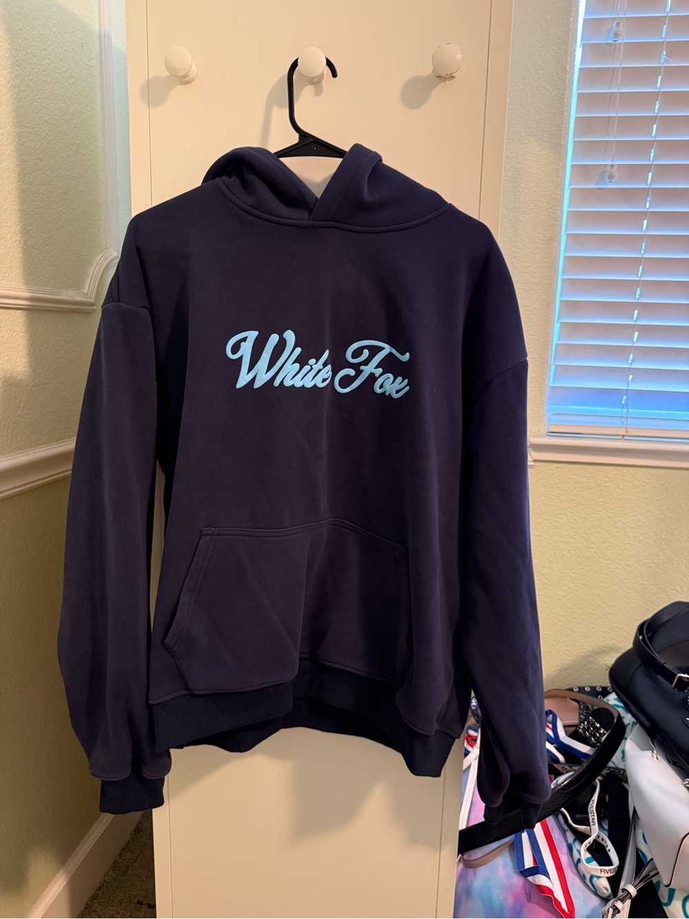 White Fox Boutique Navy Hoodie with Light Blue Script